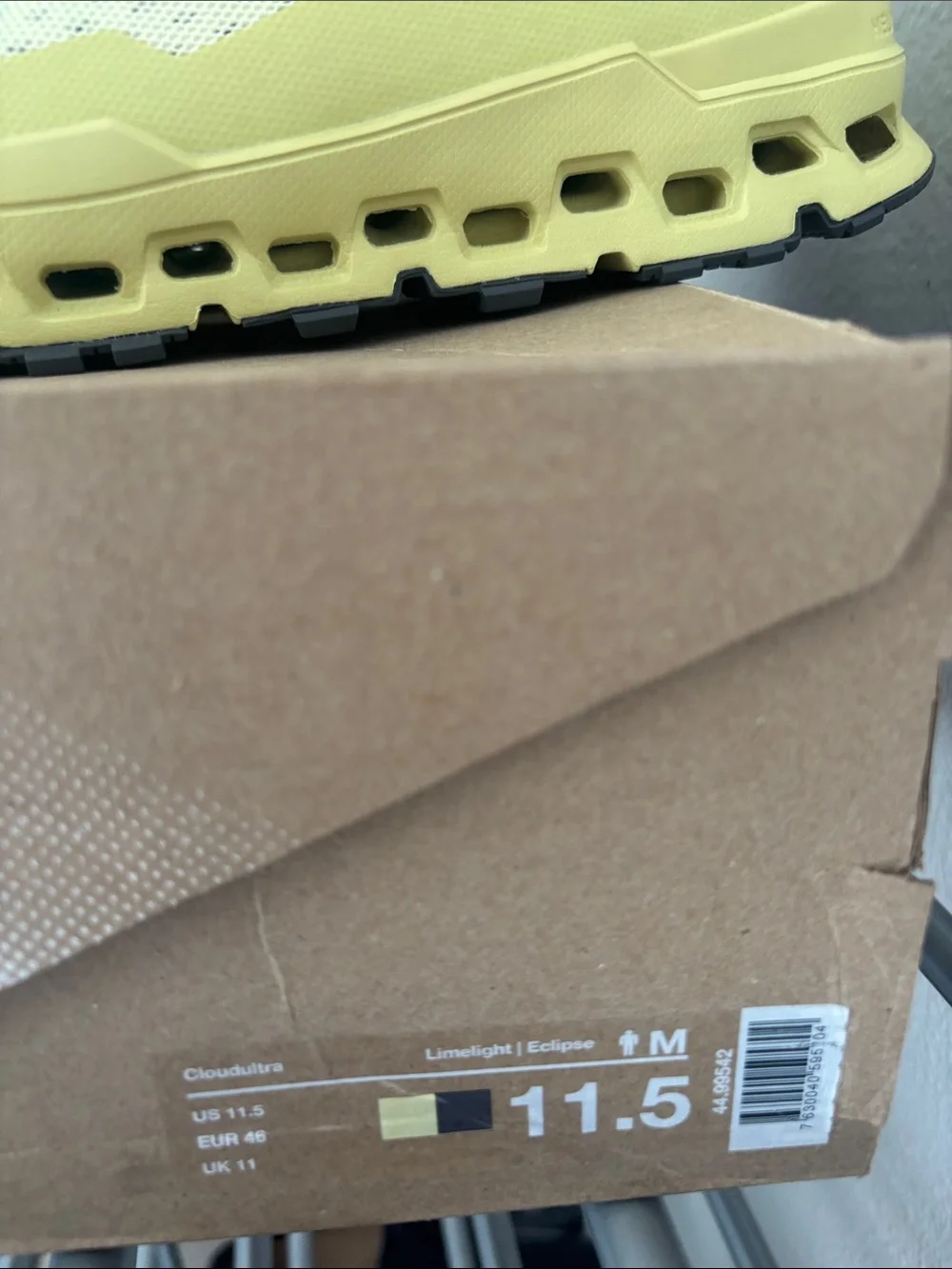 On Running Men’s limelight and Black Trail Running Shoes